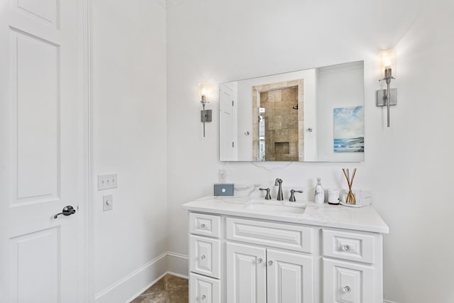 bathroom featuring walk in shower and vanity