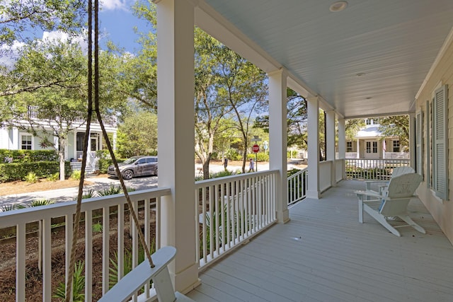 wooden deck featuring a porch