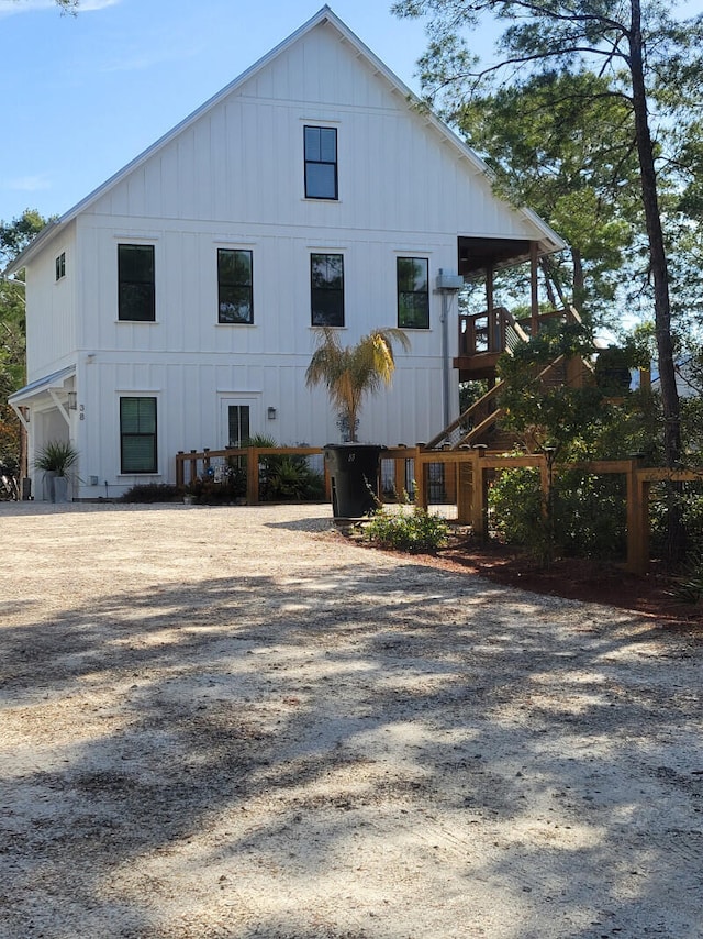 rear view of house with a garage