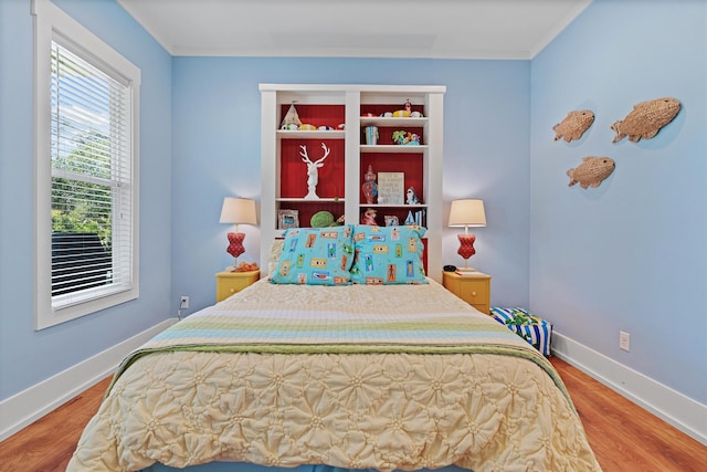 bedroom featuring hardwood / wood-style floors