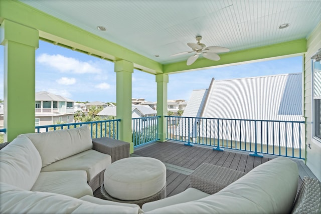 sunroom / solarium with ceiling fan