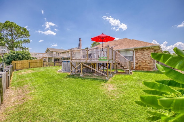 exterior space featuring a fenced backyard, stairs, and a wooden deck