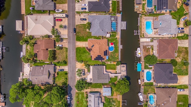 birds eye view of property with a residential view