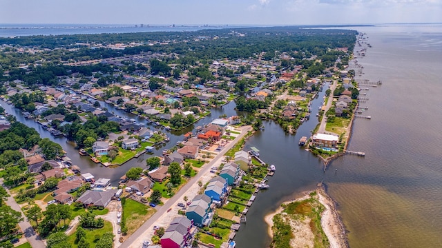 bird's eye view featuring a water view and a residential view