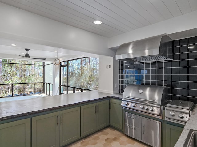 kitchen with wood ceiling, ventilation hood, green cabinets, ceiling fan, and backsplash