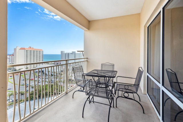 balcony featuring a water view