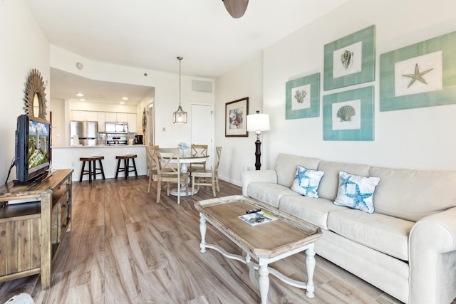 living room with light wood-type flooring