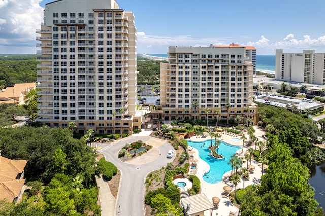 birds eye view of property with a water view