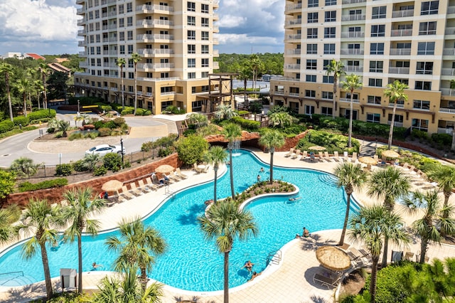 view of swimming pool with a patio area