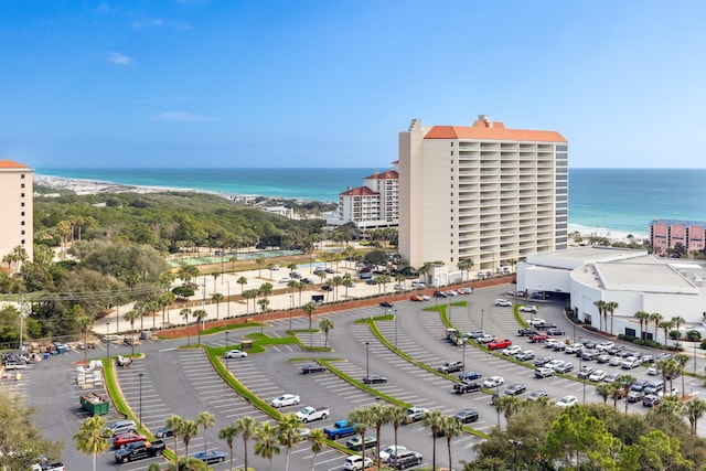 aerial view featuring a view of the beach and a water view