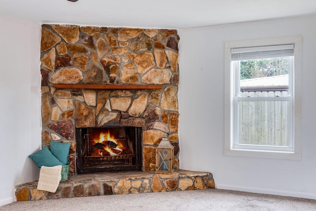 interior details with a fireplace and carpet flooring