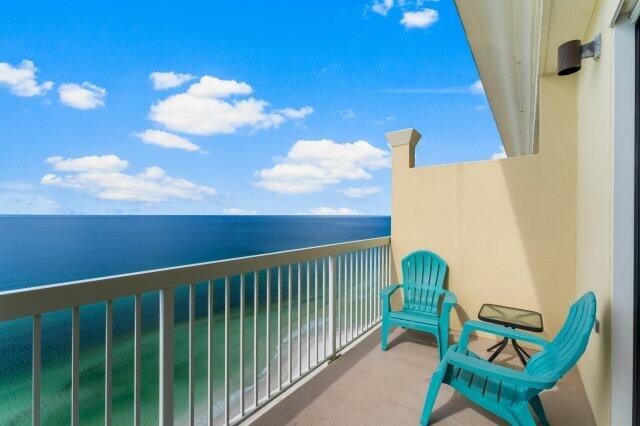 balcony featuring a water view