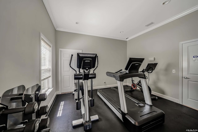 workout area with crown molding