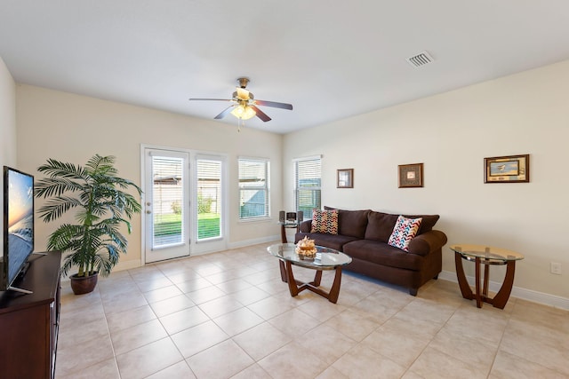 1729 Waterford Sound Blvd, Gulf Breeze, FL 32563 - living room with light tile patterned flooring and ceiling fan