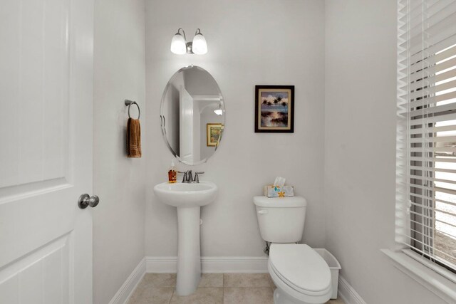 1729 Waterford Sound Blvd, Gulf Breeze, FL 32563 - bathroom with tile patterned floors, toilet, and sink