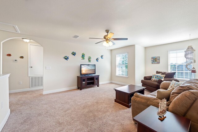 1729 Waterford Sound Blvd, Gulf Breeze, FL 32563 - carpeted living room with ceiling fan and plenty of natural light