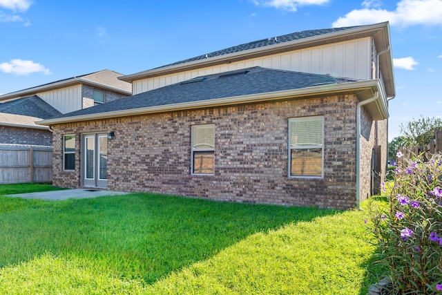 1729 Waterford Sound Blvd, Gulf Breeze, FL 32563 - rear view of house featuring a yard and a patio area