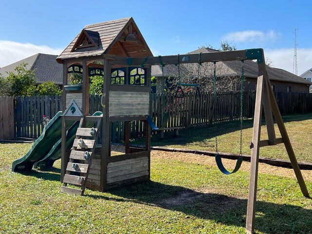 1729 Waterford Sound Blvd, Gulf Breeze, FL 32563 - view of play area with a lawn