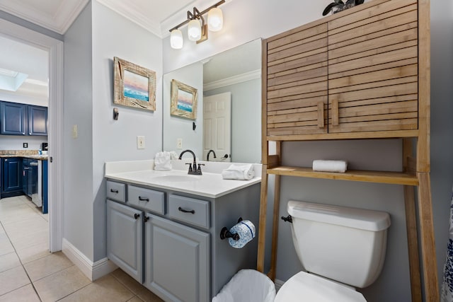 bathroom with vanity, tile patterned floors, ornamental molding, and toilet