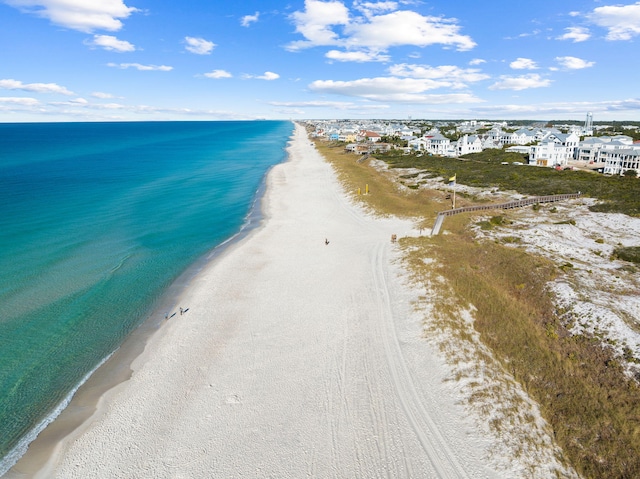 aerial view with a view of the beach and a water view