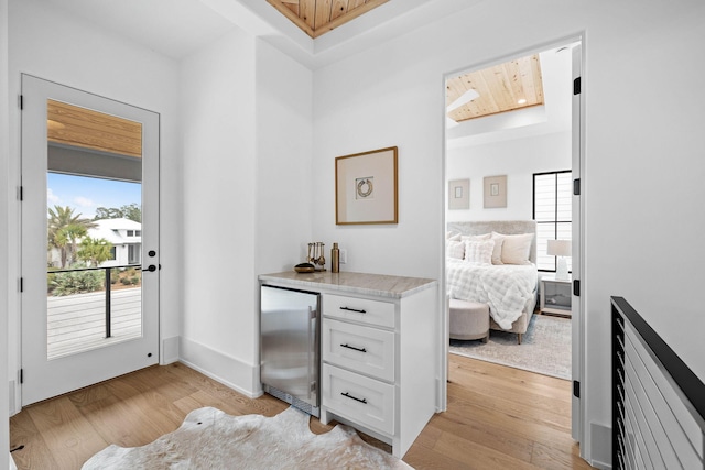 office space with light hardwood / wood-style flooring