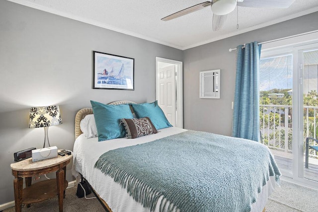 bedroom with carpet flooring, ornamental molding, access to exterior, ceiling fan, and a textured ceiling