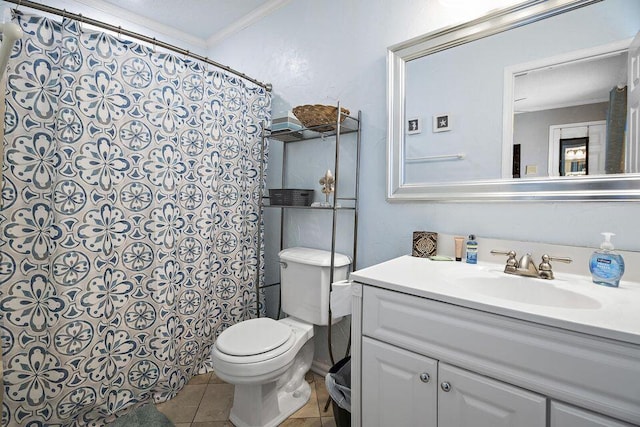 bathroom with tile patterned flooring, vanity, ornamental molding, a shower with curtain, and toilet