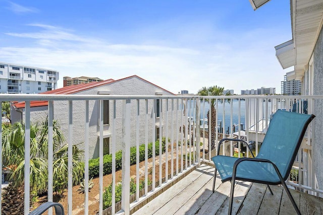 balcony featuring a water view