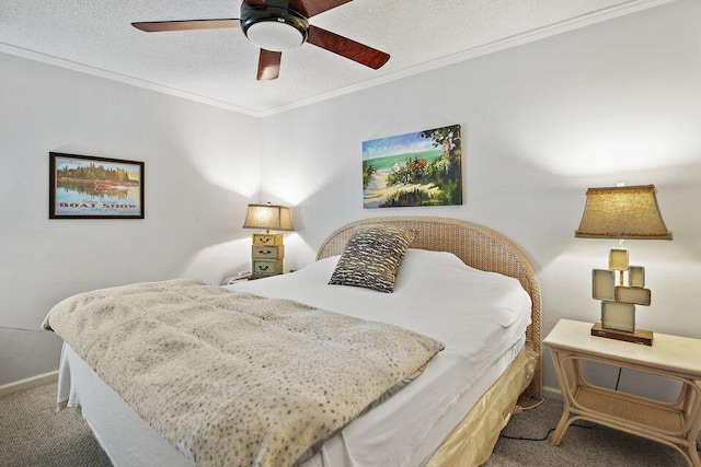 carpeted bedroom featuring ceiling fan, ornamental molding, and a textured ceiling
