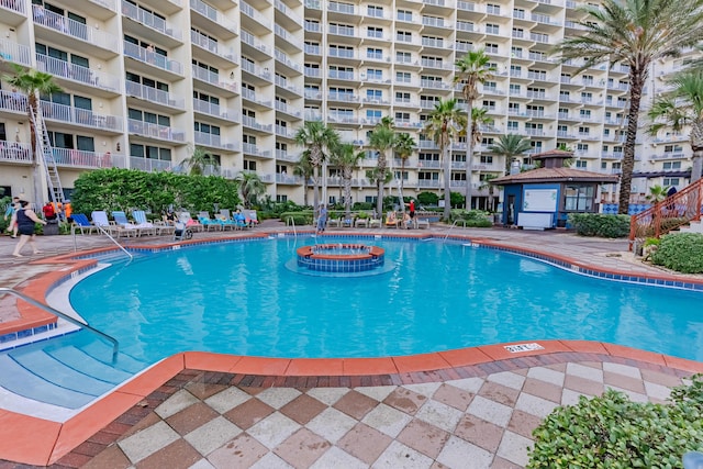 view of swimming pool with a gazebo, a hot tub, and a patio