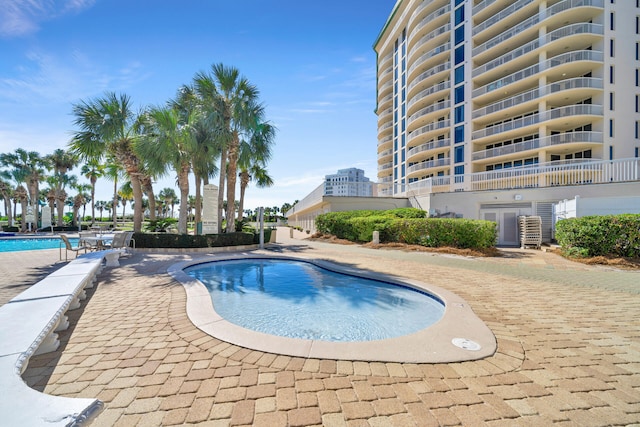 pool with a patio area