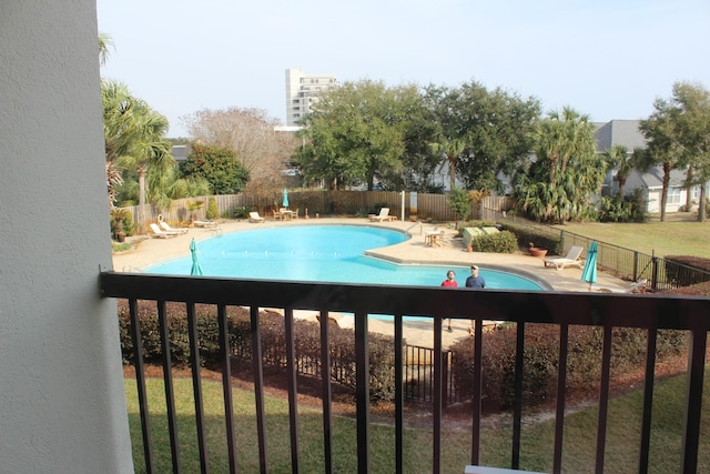 view of swimming pool with a patio