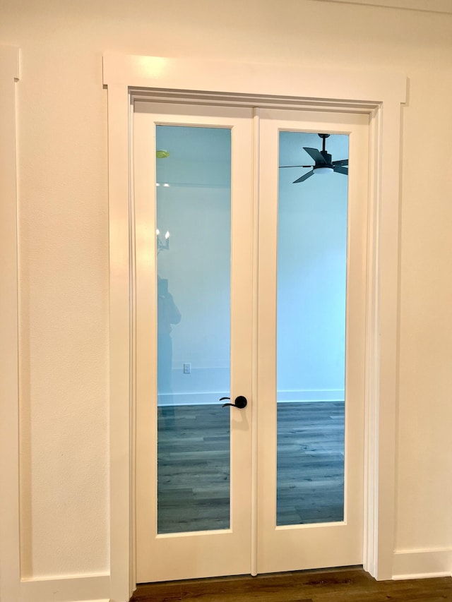 entryway with french doors, ceiling fan, baseboards, and wood finished floors