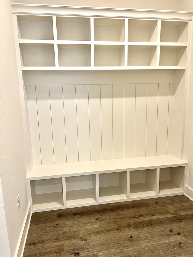 mudroom with dark wood-style flooring