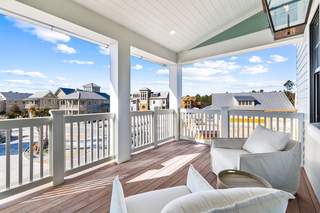 wooden deck with an outdoor hangout area