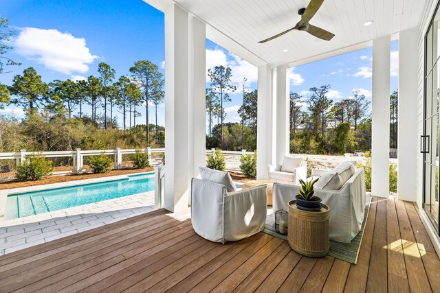 sunroom / solarium with ceiling fan