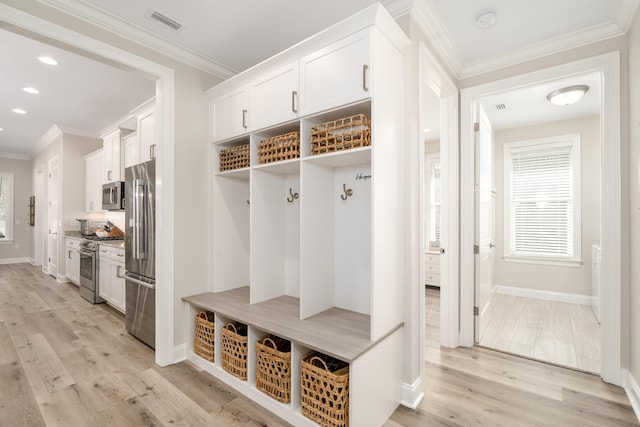 mudroom featuring recessed lighting, visible vents, light wood-style floors, and crown molding