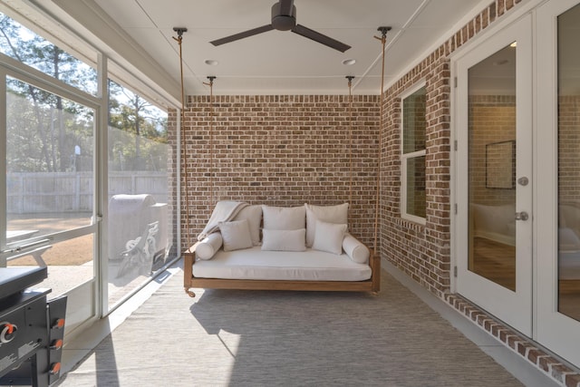 sunroom / solarium with ceiling fan