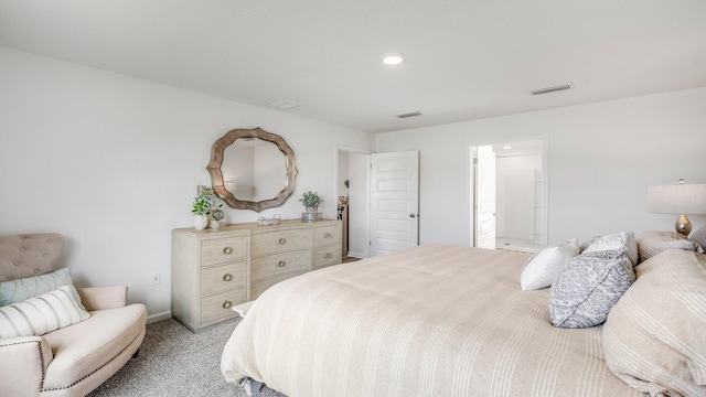 bedroom with light carpet