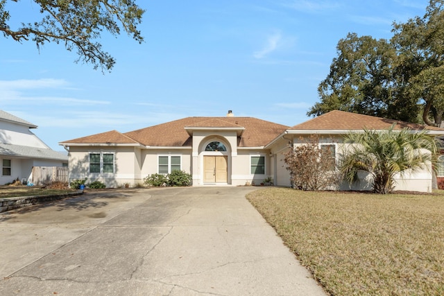 view of front of home with a front yard