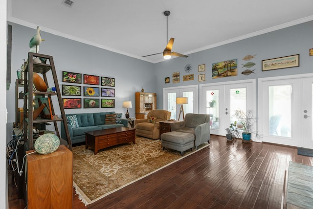 living room with crown molding, hardwood / wood-style flooring, french doors, and ceiling fan