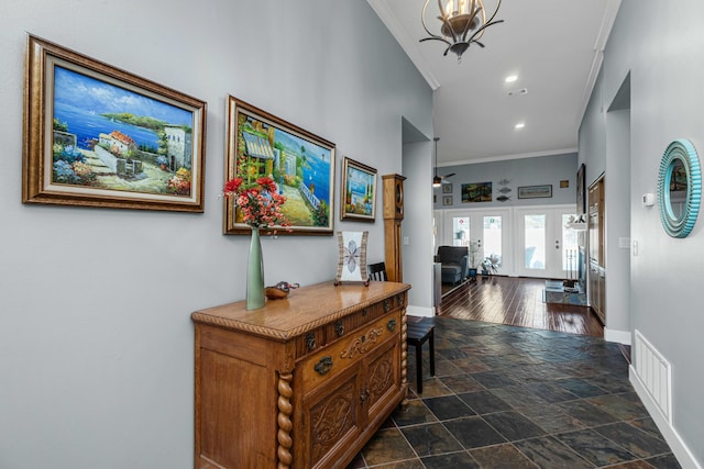 hall featuring ornamental molding