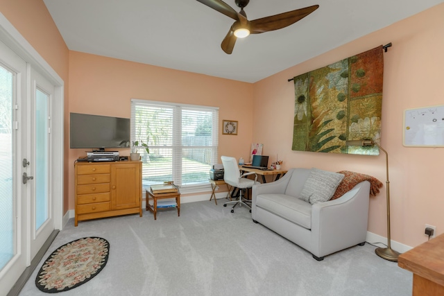 office area with carpet floors and ceiling fan