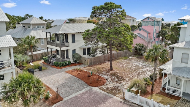 view of front of home featuring a balcony