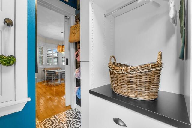 walk in closet featuring hardwood / wood-style floors