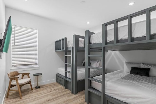 bedroom with light hardwood / wood-style floors