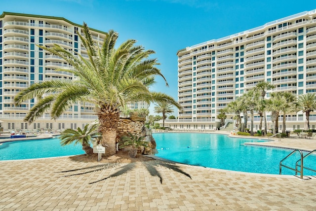 pool with a patio