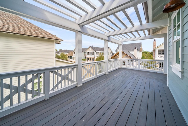 wooden terrace with a pergola