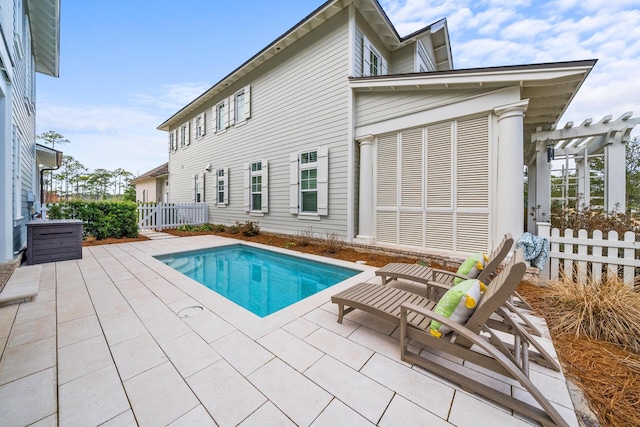 view of pool with a patio area and a pergola