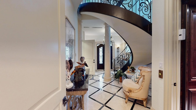entrance foyer featuring decorative columns